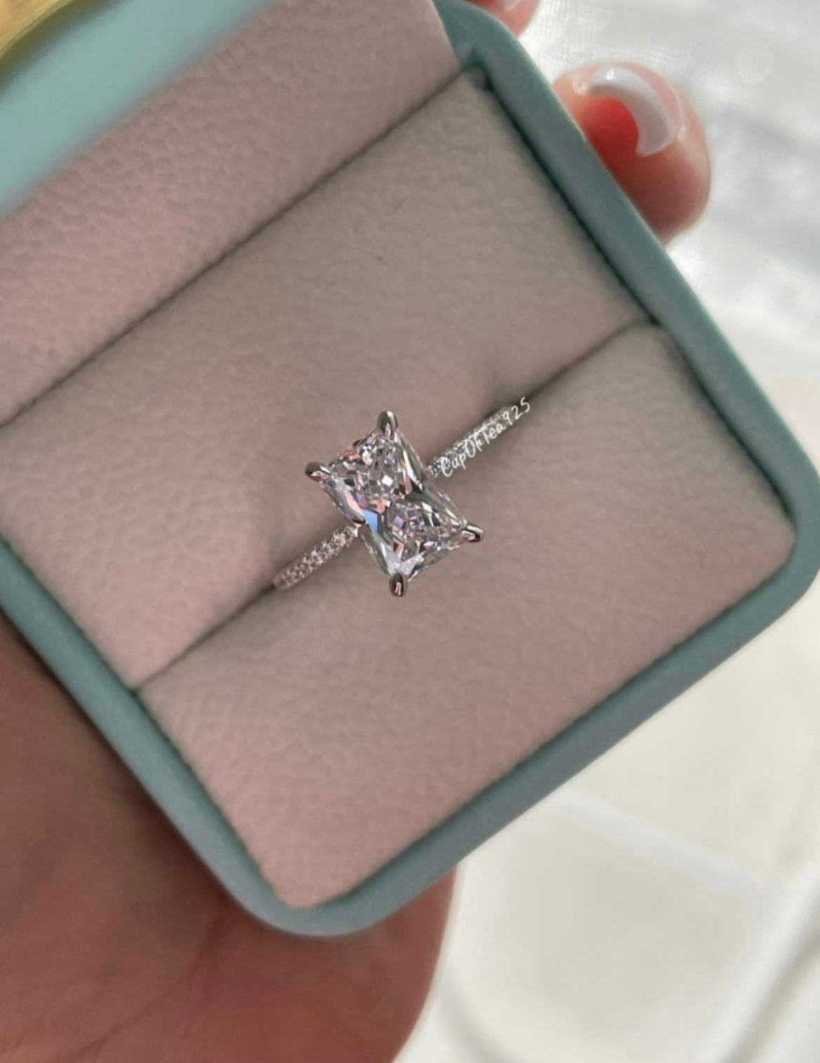 The Harmony. Sterling Silver 925 engagement ring with 2.25CT radiant cut simulated diamond and hidden halo.