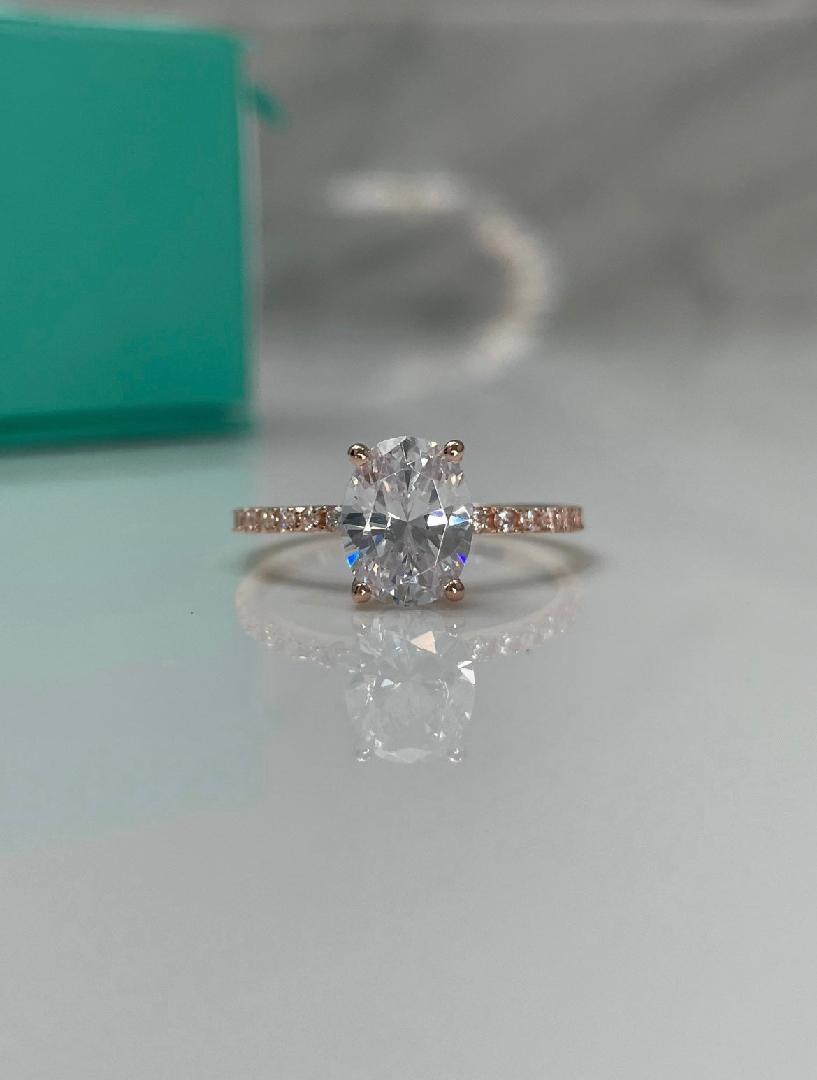 The Olivia. Rose Gold Vermeil, yellow gold vermeil, white gold vermeil engagement ring with 2CT oval cut simulated diamond