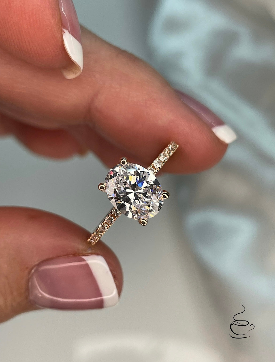 The Olivia. Rose Gold Vermeil, yellow gold vermeil, white gold vermeil engagement ring with 2CT oval cut simulated diamond