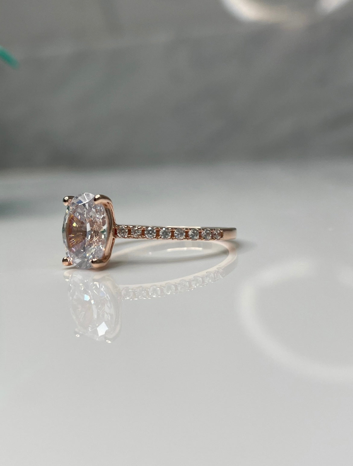 The Olivia. Rose Gold Vermeil, yellow gold vermeil, white gold vermeil engagement ring with 2CT oval cut simulated diamond