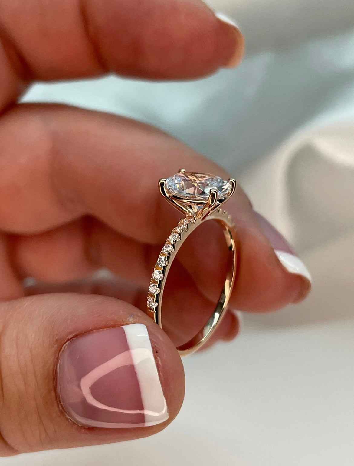 The Olivia. Rose Gold Vermeil, yellow gold vermeil, white gold vermeil engagement ring with 2CT oval cut simulated diamond