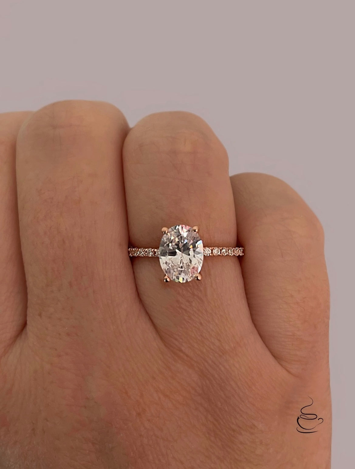 The Olivia. Rose Gold Vermeil, yellow gold vermeil, white gold vermeil engagement ring with 2CT oval cut simulated diamond