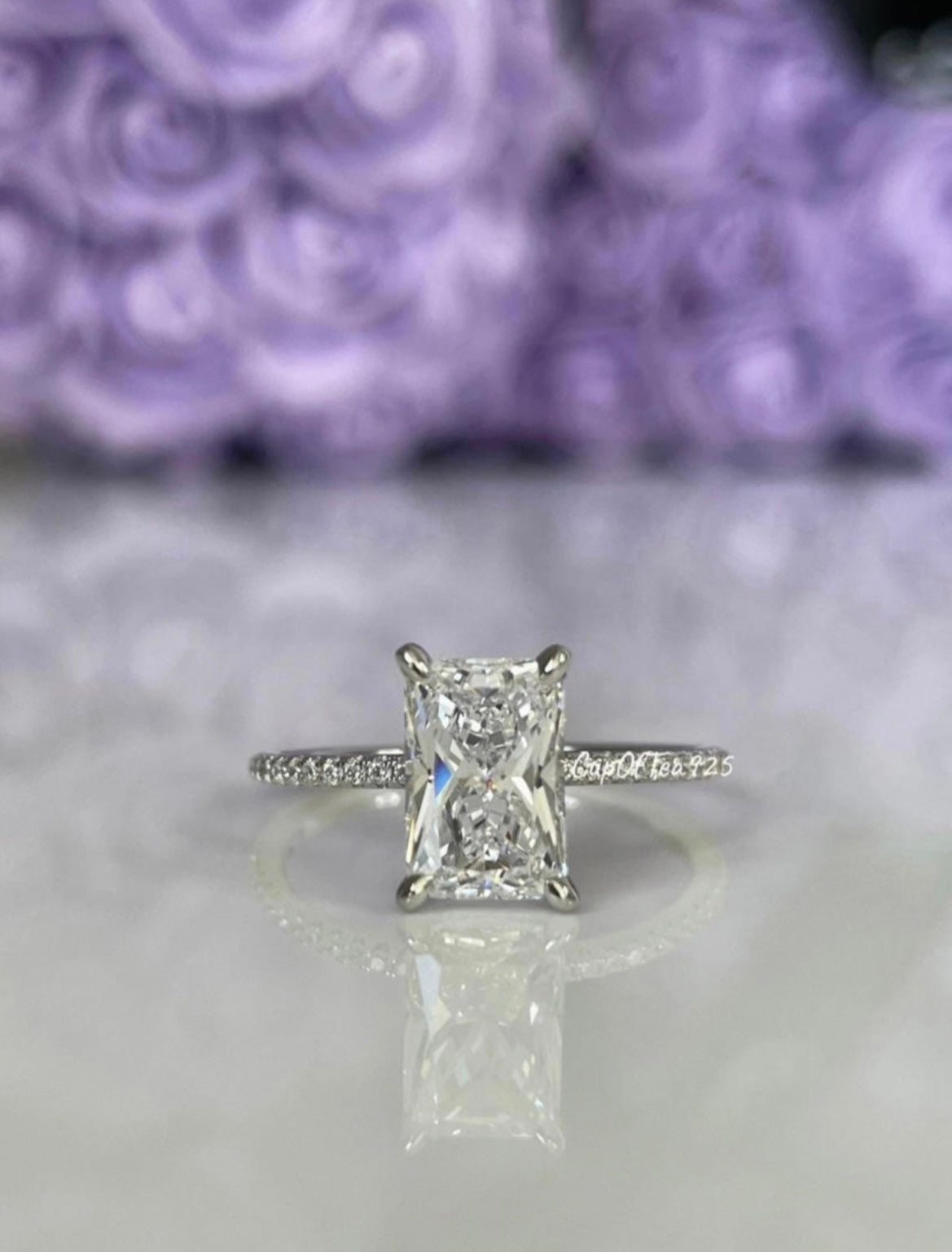 The Harmony. Sterling Silver 925 engagement ring with 2.25CT radiant cut simulated diamond and hidden halo.
