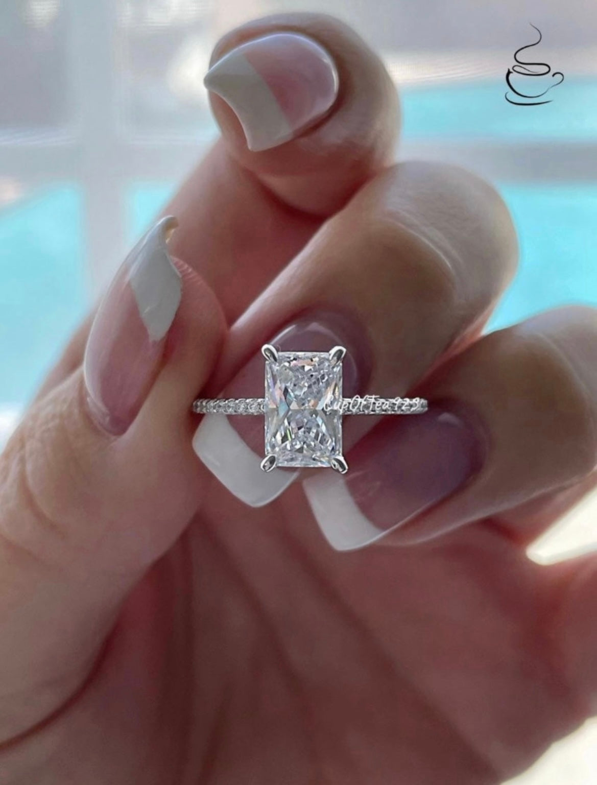 The Harmony. Sterling Silver 925 engagement ring with 2.25CT radiant cut simulated diamond and hidden halo.
