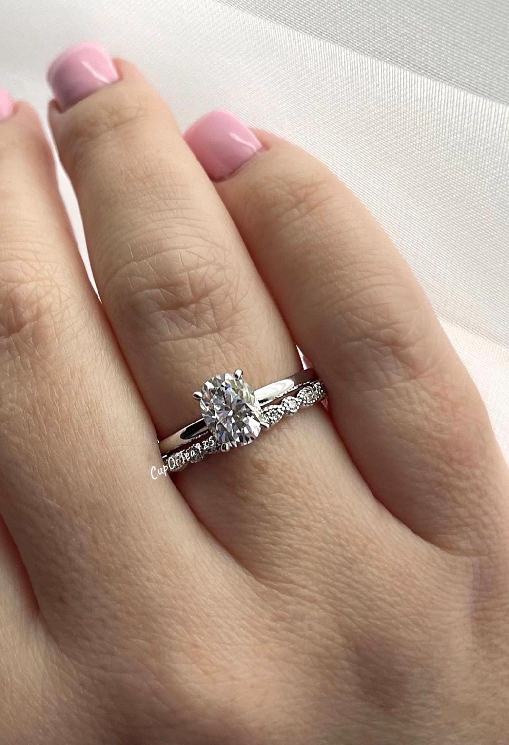 Moissanite. Sterling Silver 925 engagement ring set with 1.5CT oval cut D VVS moissanite and half eternity art deco moissanite band