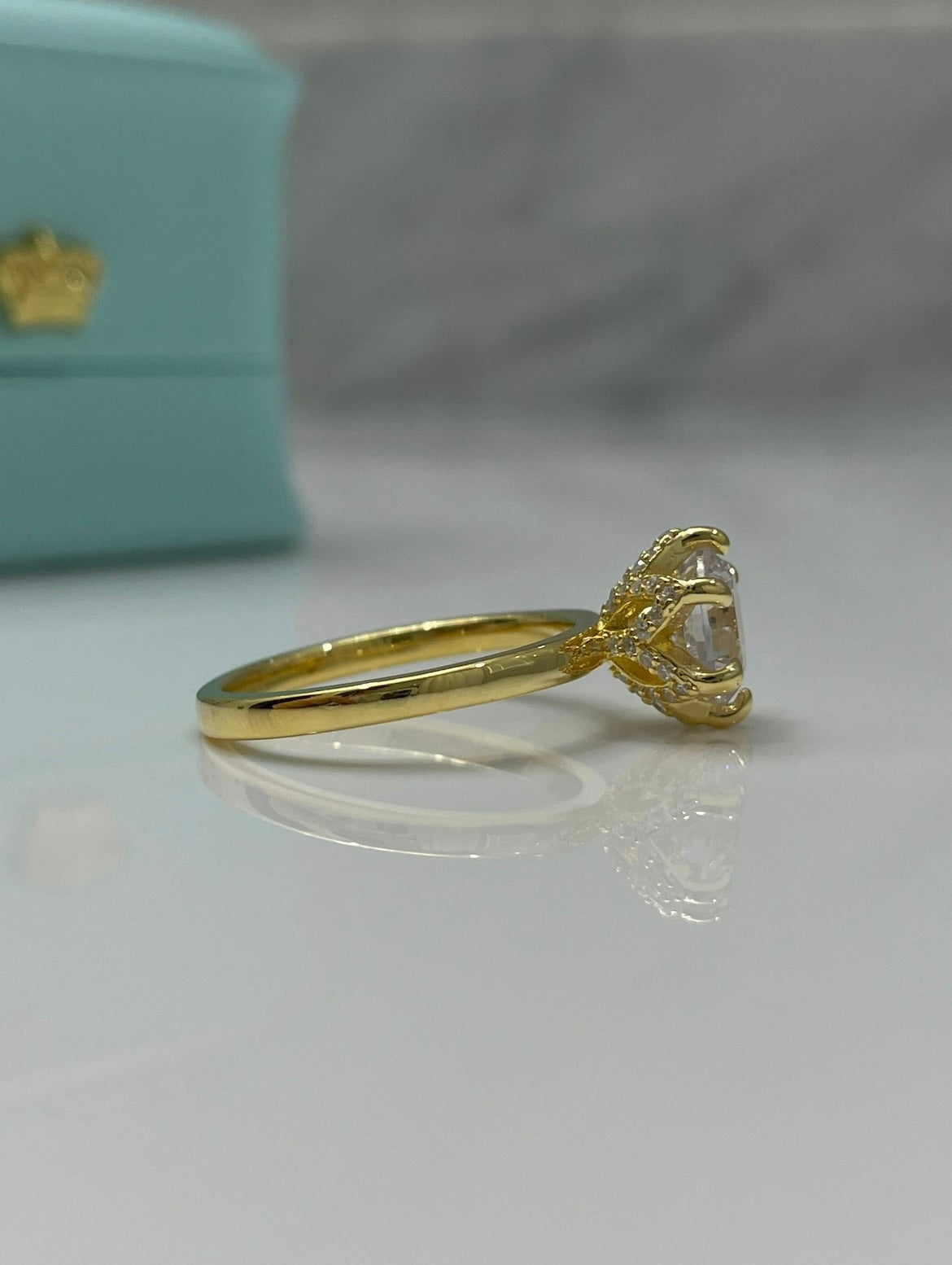 The Bella. Sterling Silver 925, yellow gold vermeil engagement ring with 2CT round brilliant cut simulated diamond.