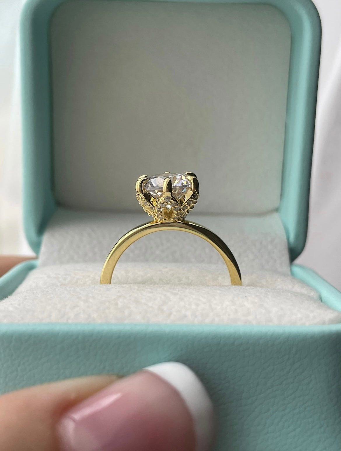 The Bella. Sterling Silver 925, yellow gold vermeil engagement ring with 2CT round brilliant cut simulated diamond.