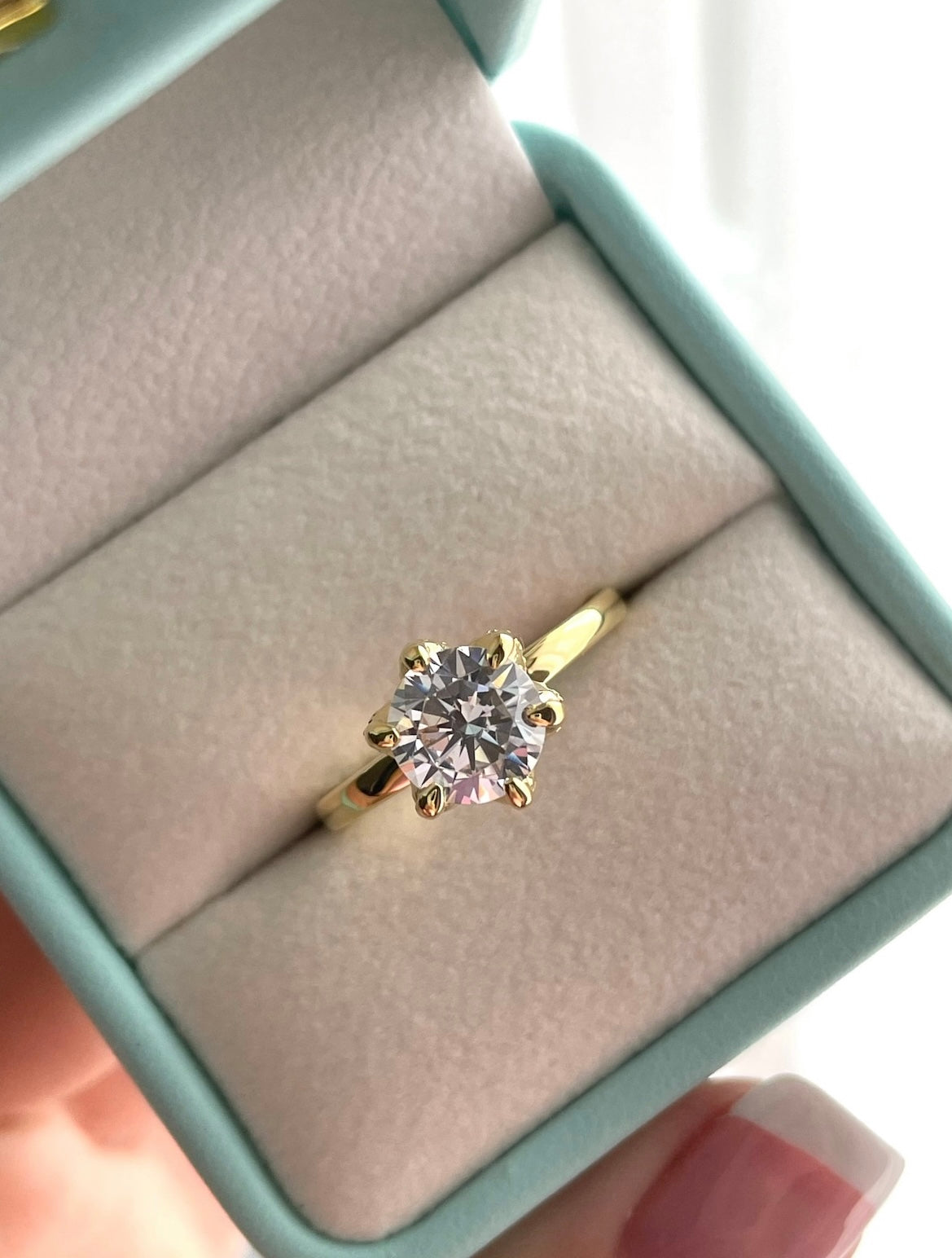 The Bella. Sterling Silver 925, yellow gold vermeil engagement ring with 2CT round brilliant cut simulated diamond.