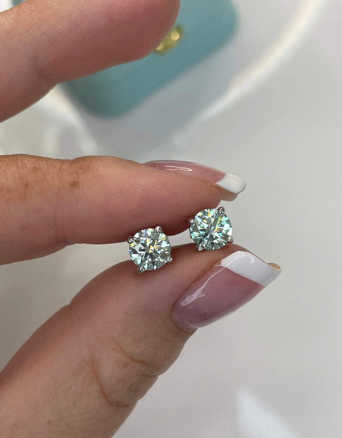 Certified aqua-blue-green moissanite stud earrings In Sterling Silver 925