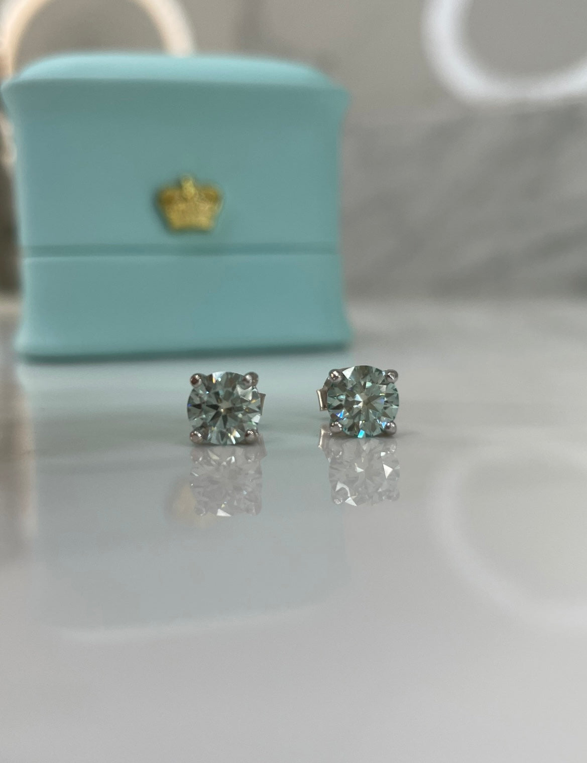 Certified aqua-blue-green moissanite stud earrings In Sterling Silver 925