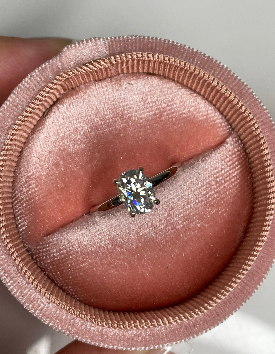 Moissanite. Sterling Silver 925 solitaire engagement ring with 1.5CT oval cut crispy clear moissanite.