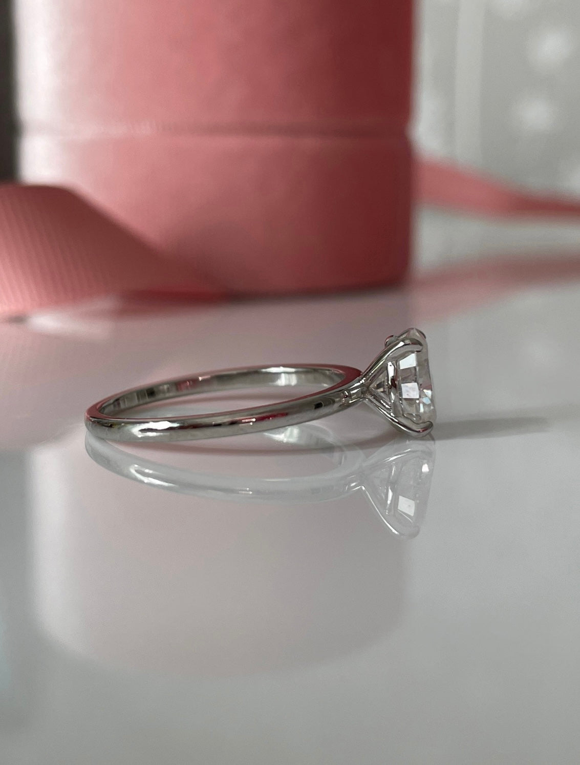 Moissanite. Sterling Silver 925 solitaire engagement ring with 1.5CT oval cut crispy clear moissanite.