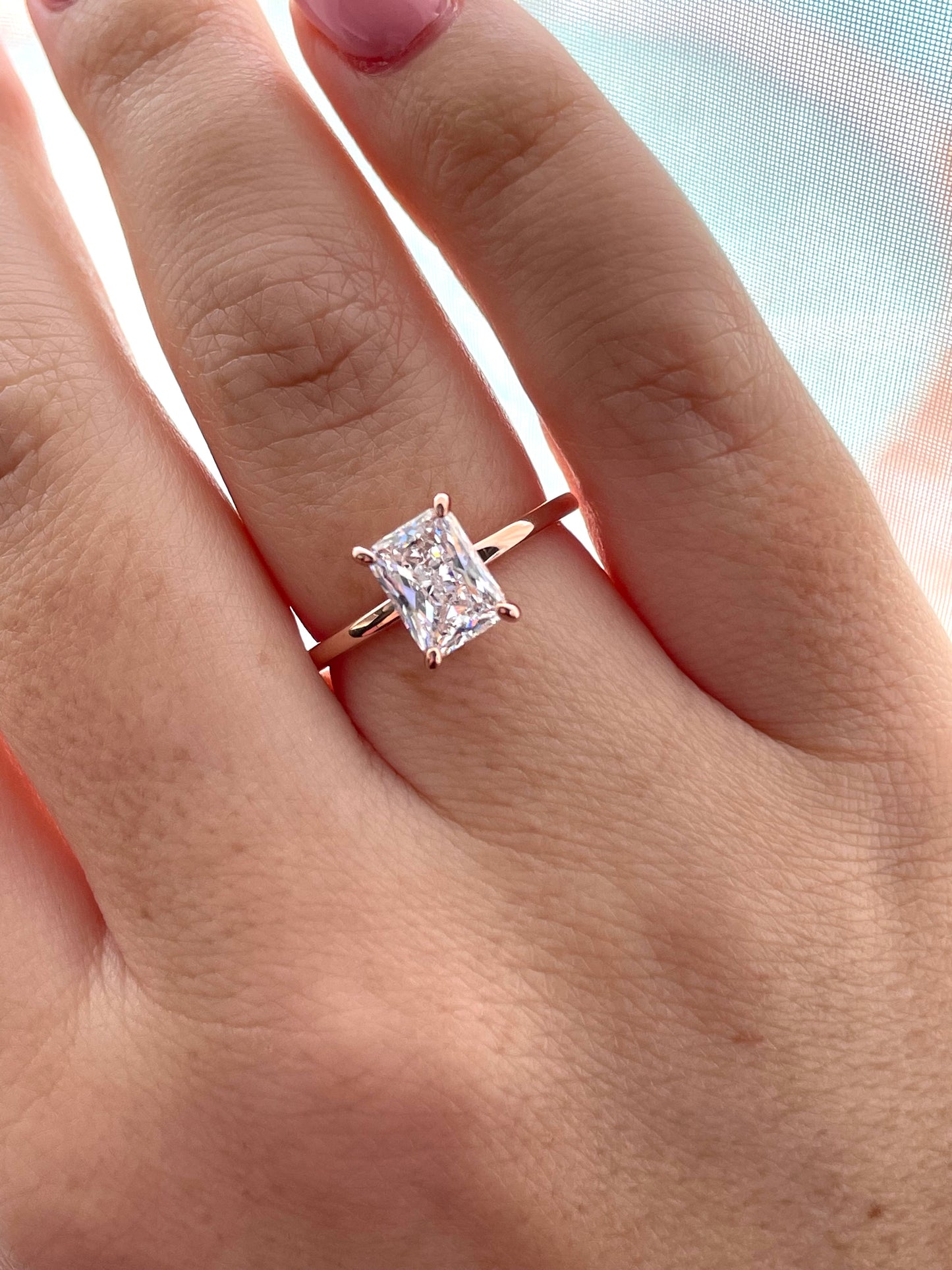 The Alessandra. Rose Gold Vermeil Engagement Ring with 2CT radiant Cut Simulated Diamond