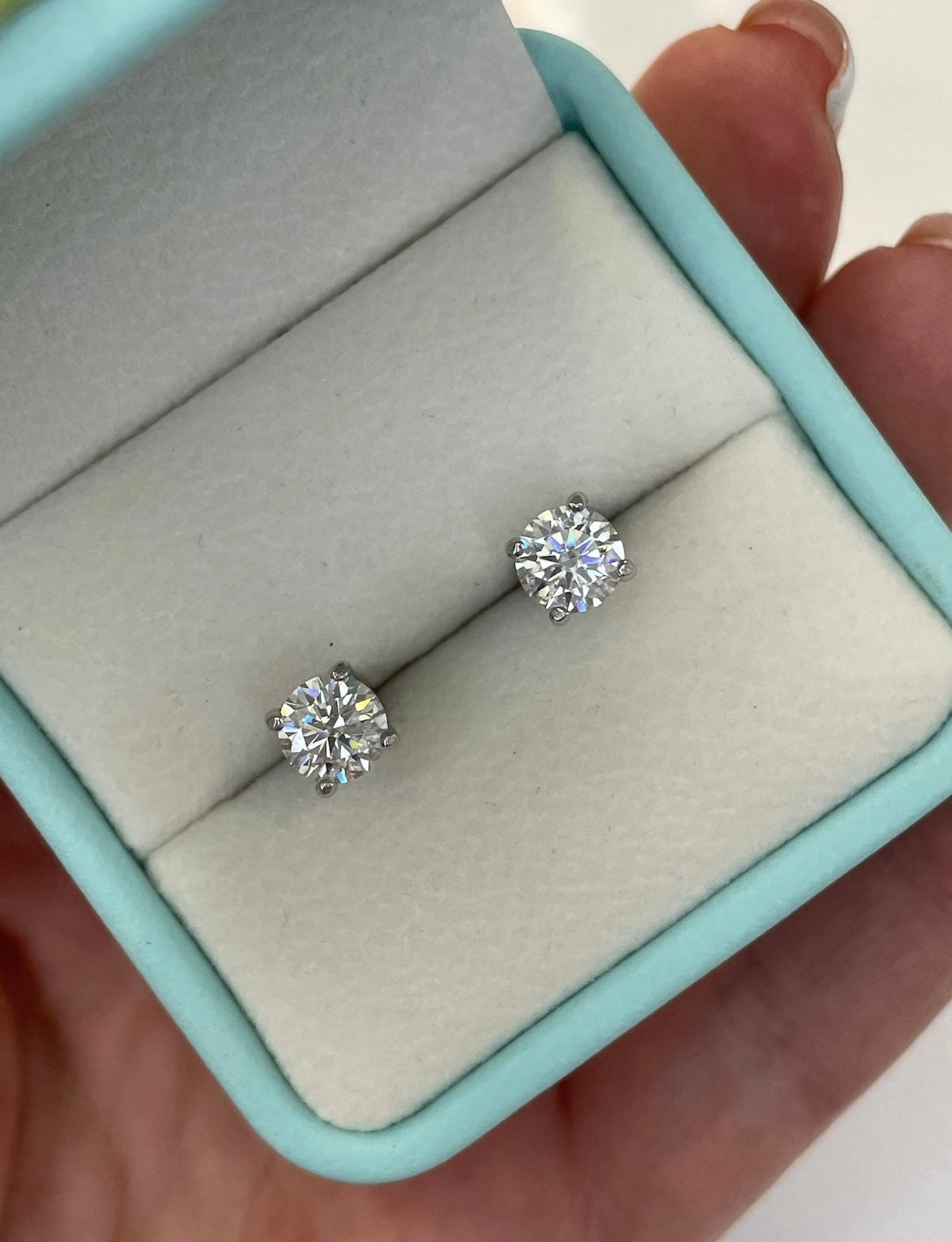 Moissanite stud earrings.