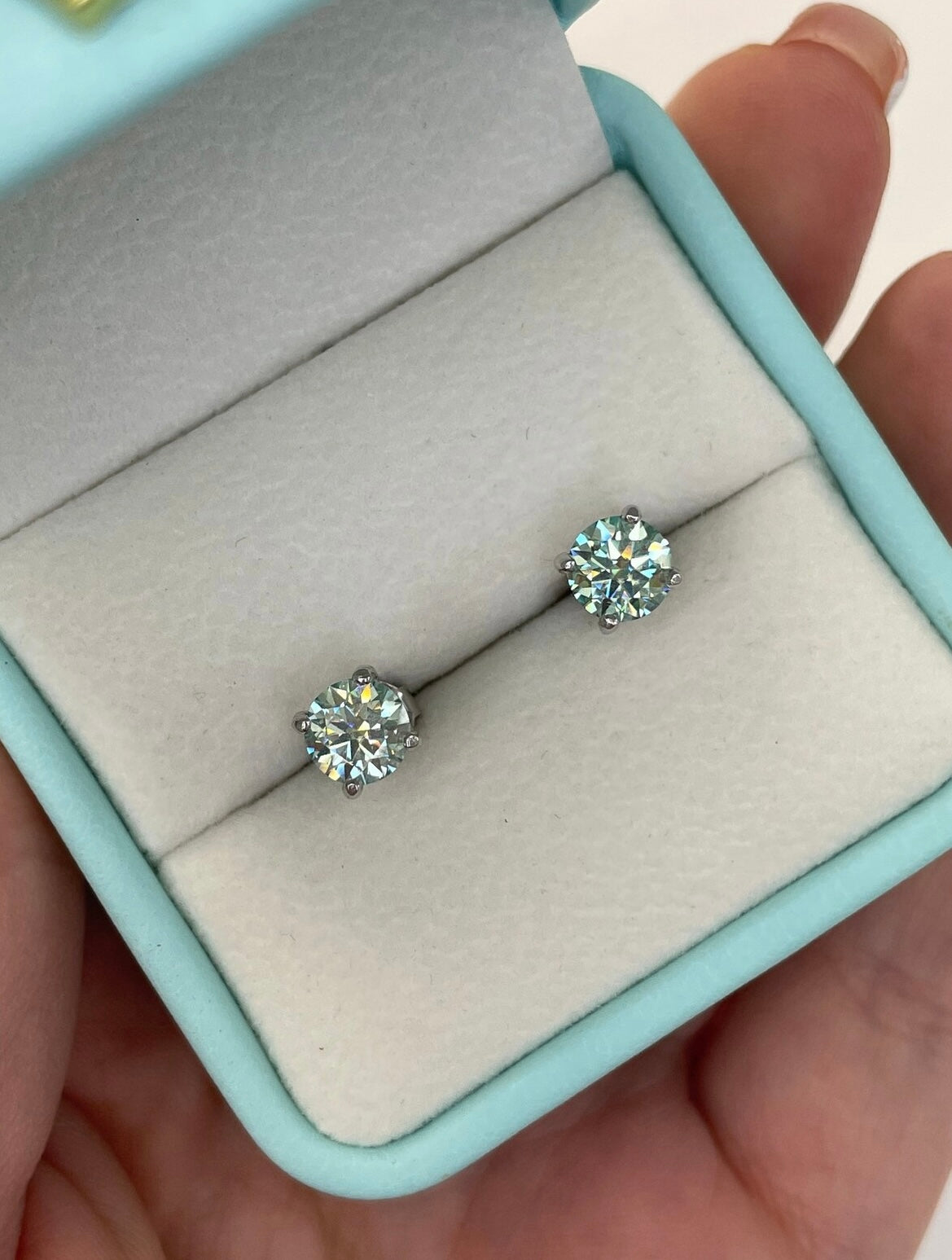Certified aqua-blue-green moissanite stud earrings In Sterling Silver 925