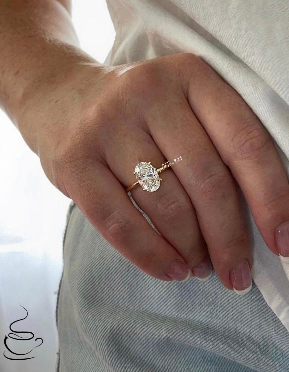 The Brooklyn. Yellow gold vermeil, white gold vermeil stunning solitaire with 3.5CT oval cut simulated diamond.