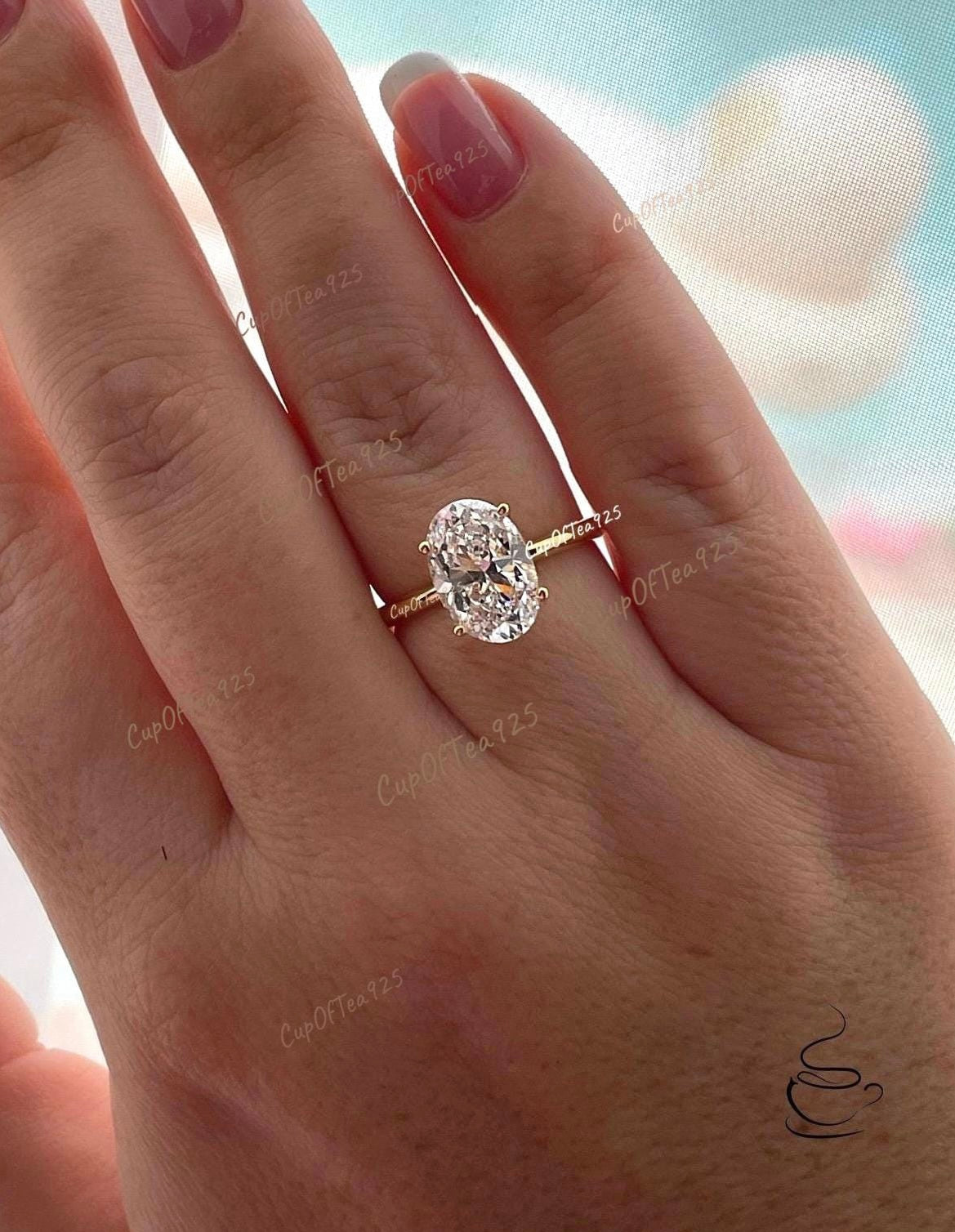 The Brooklyn. Yellow gold vermeil, white gold vermeil stunning solitaire with 3.5CT oval cut simulated diamond.