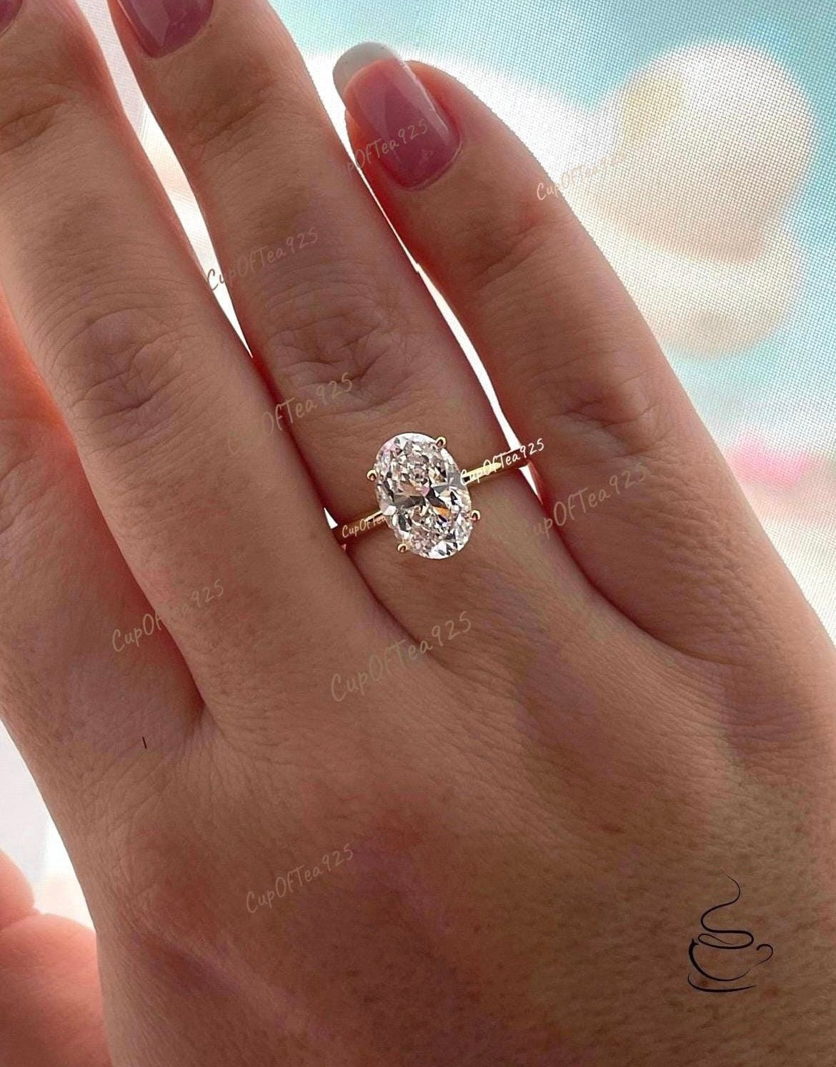 The Brooklyn. Yellow gold vermeil, white gold vermeil stunning solitaire with 3.5CT oval cut simulated diamond.