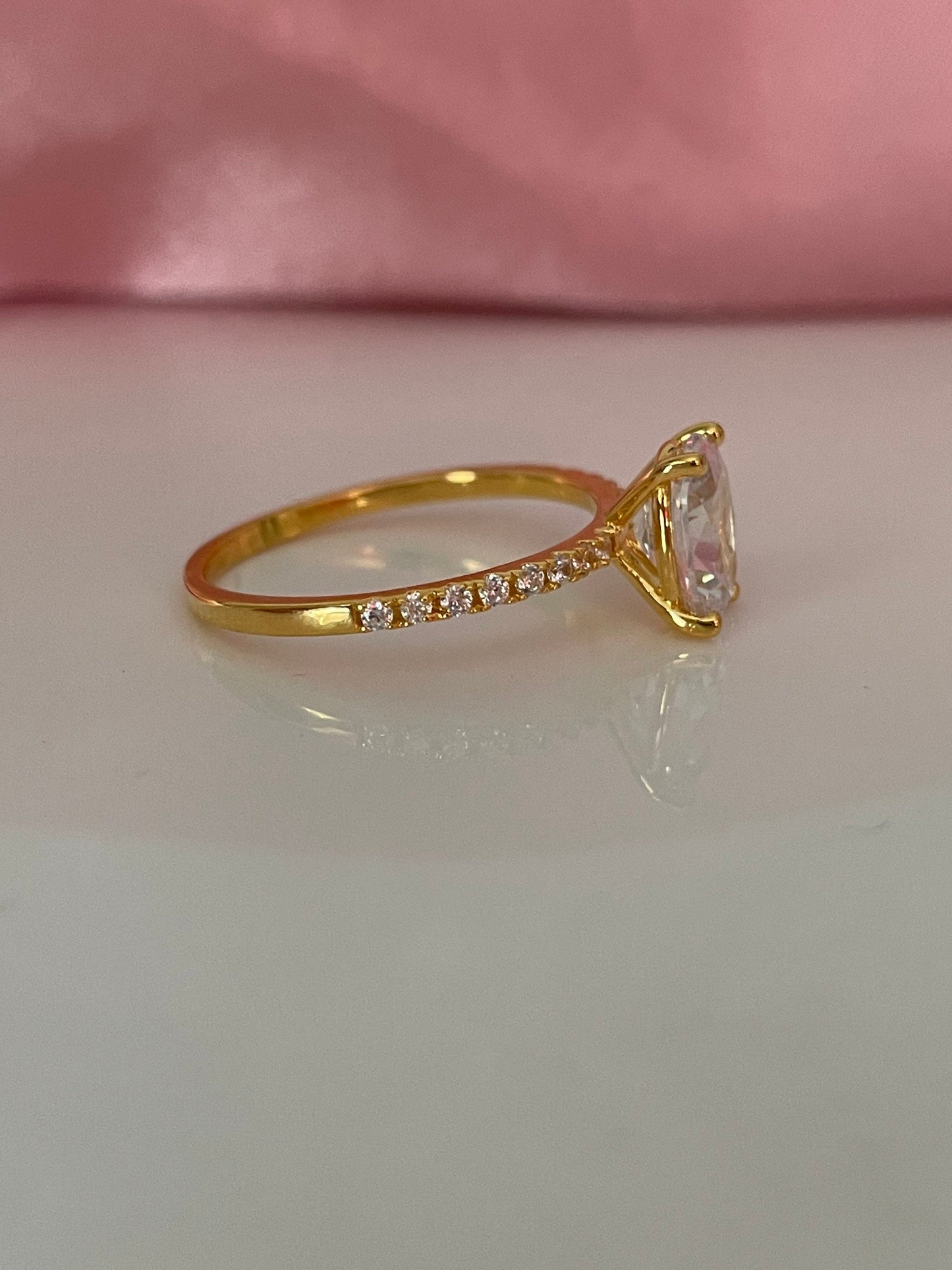 The Olivia. Yellow Gold Vermeil Engagement Ring with the finest 2CT oval cut simulated diamond
