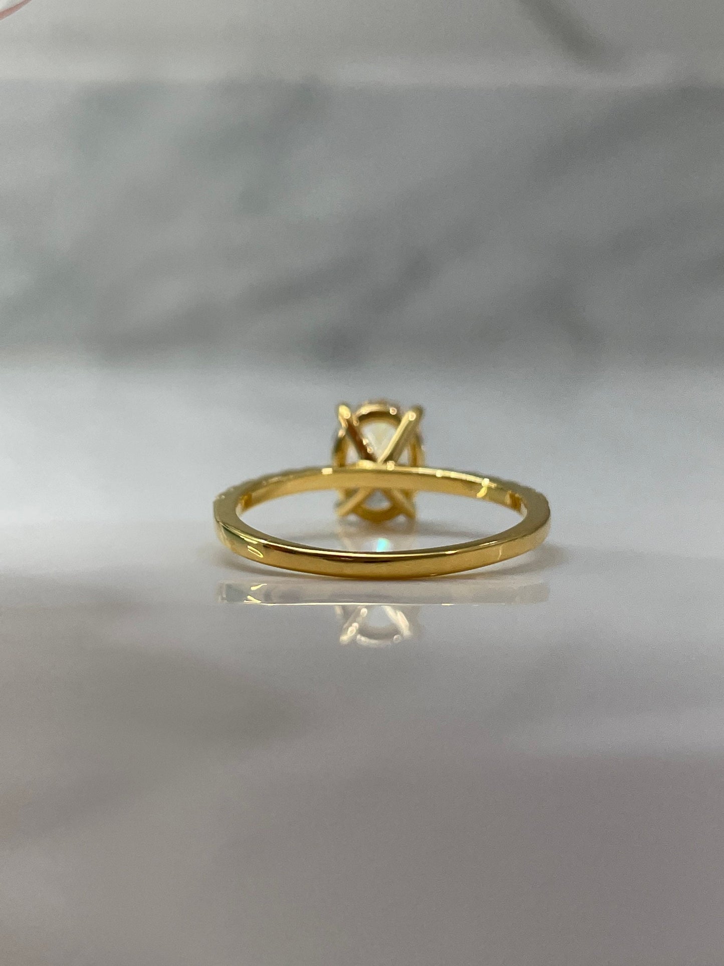 The Olivia. Yellow Gold Vermeil Engagement Ring with the finest 2CT oval cut simulated diamond