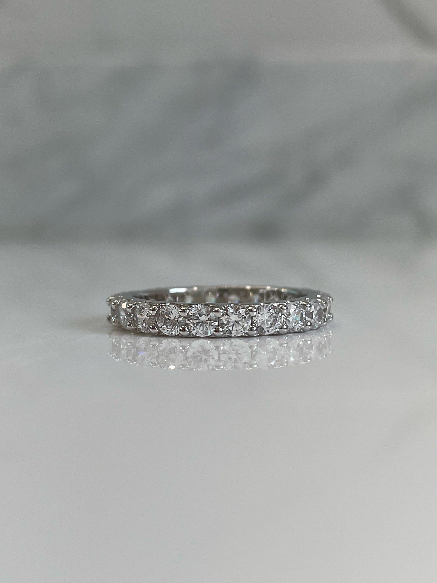 The Scarlett 3mm. Sterling Silver 925 3mm full eternity band with the finest simulated diamonds.