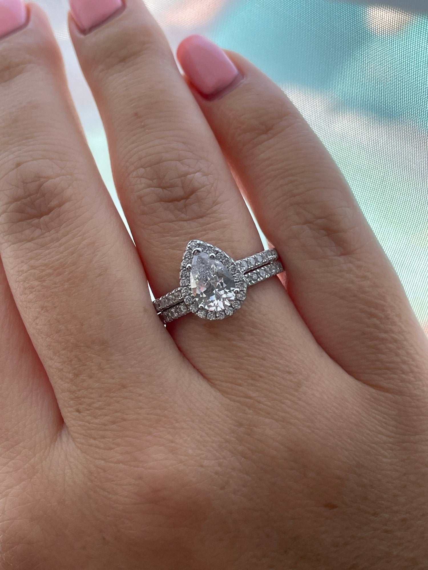 The Naomi. Sterling Silver 925 Pear Shaped, Tear Drop Engagement Ring with the Finest 5A CZ Diamonds