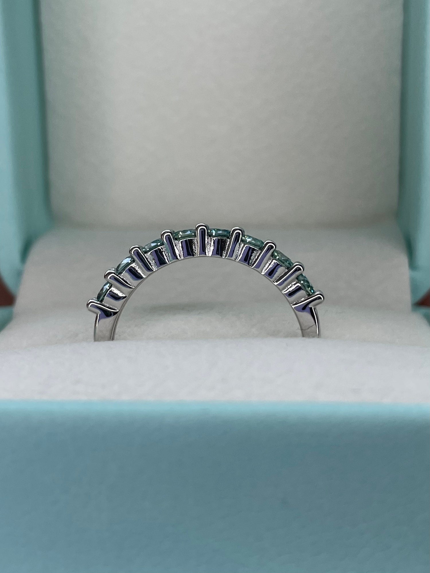 Aqua Blue Moissanite ring. Sterling silver 925 half eternity band with Aqua Blue Moissanite