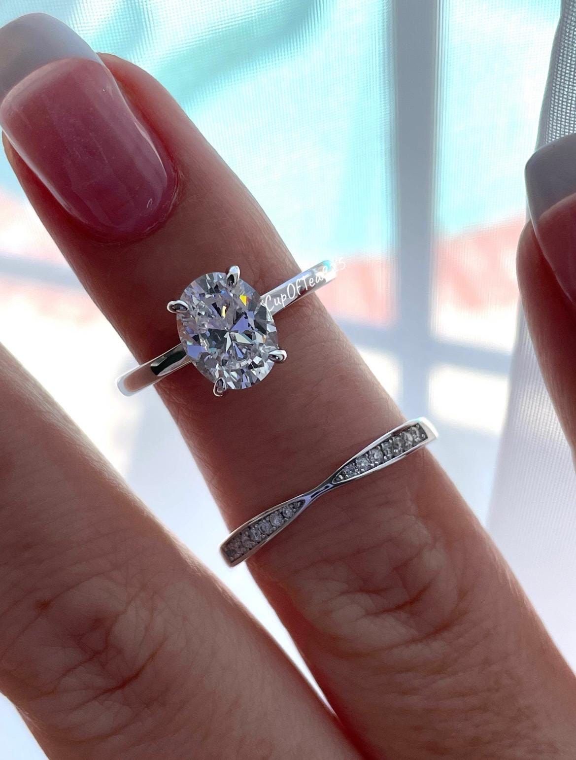 Moissanite engagement ring set. Sterling Silver 925 bridal set with 2CT oval cut moissanite or CZ solitaire and curved moisanite band.