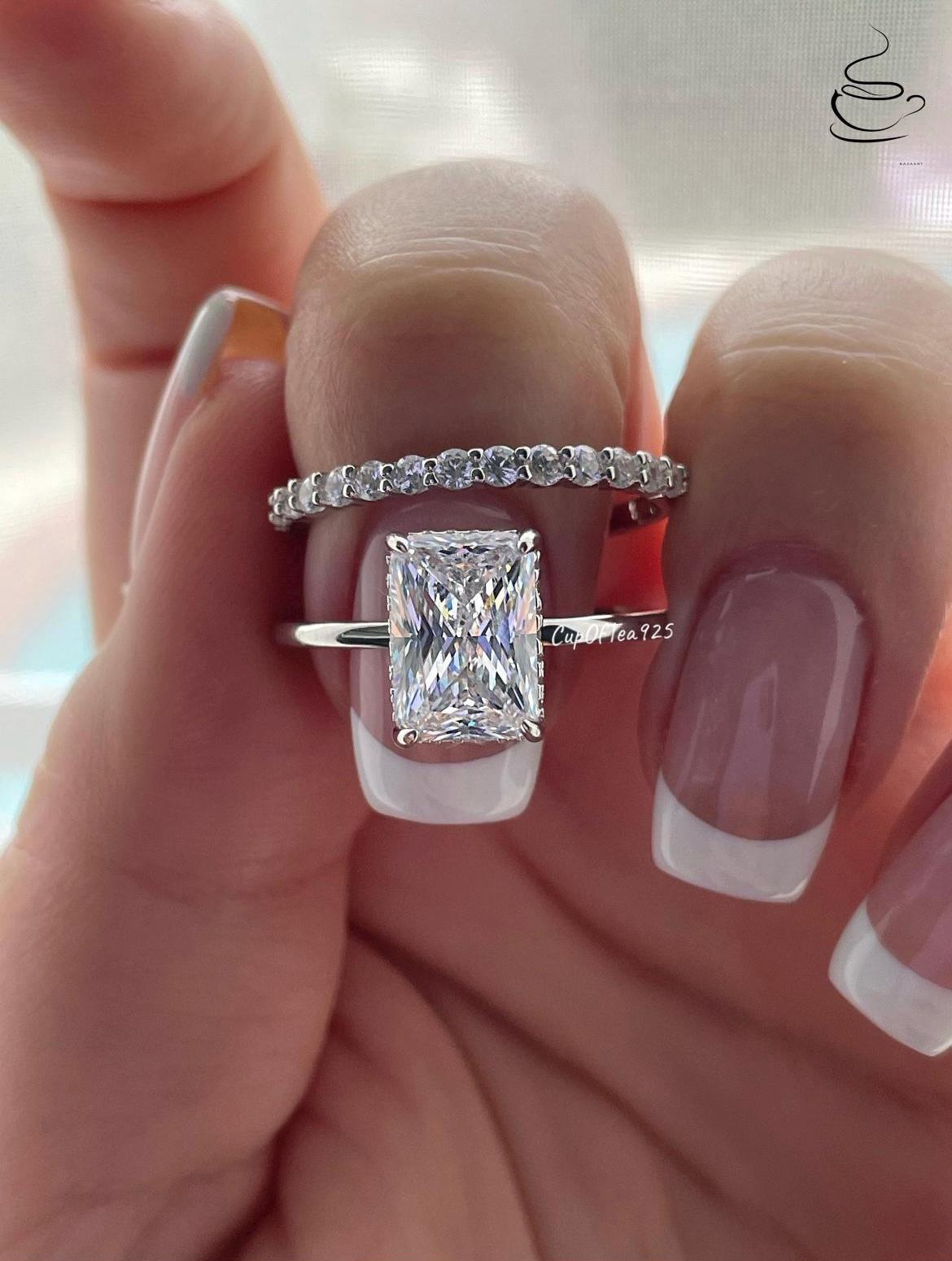 New In! Sterling Silver 925 Bridal Set with 2CT or 3CT CZ Radiant Cut engagement ring with hidden halo and half eternity band.