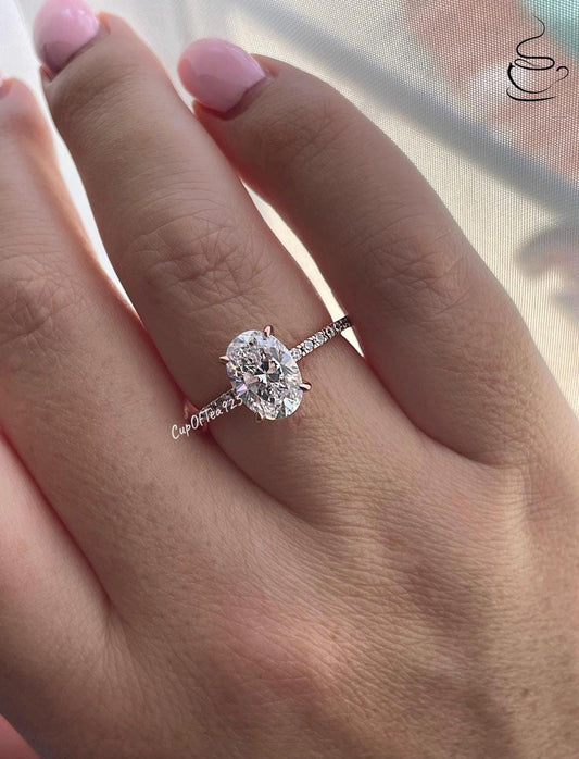The Stella. Hidden Halo. Rose gold over Sterling Silver 925 engagement ring with 2.2CT oval cut the finest 6A CZ simulated diamonds