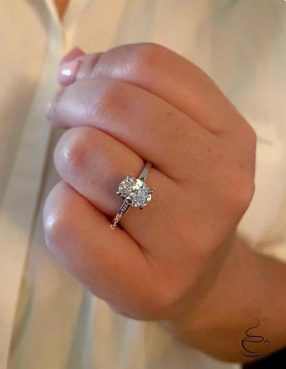 Sterling Silver 925 Engagement Ring with 2CT(7mm*9mm) oval cut simulated diamond and hidden halo