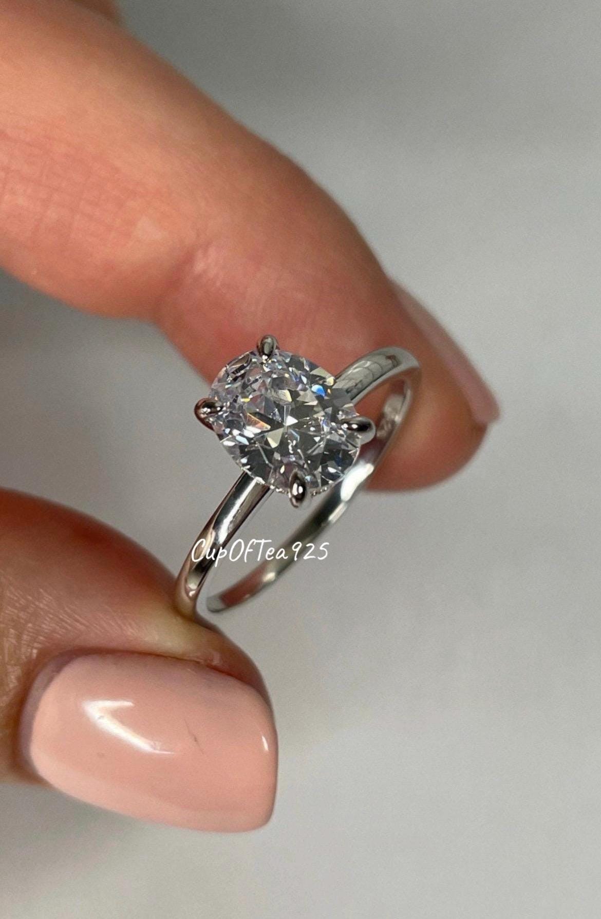 Sterling Silver 925 Engagement Ring with 2CT(7mm*9mm) oval cut simulated diamond and hidden halo