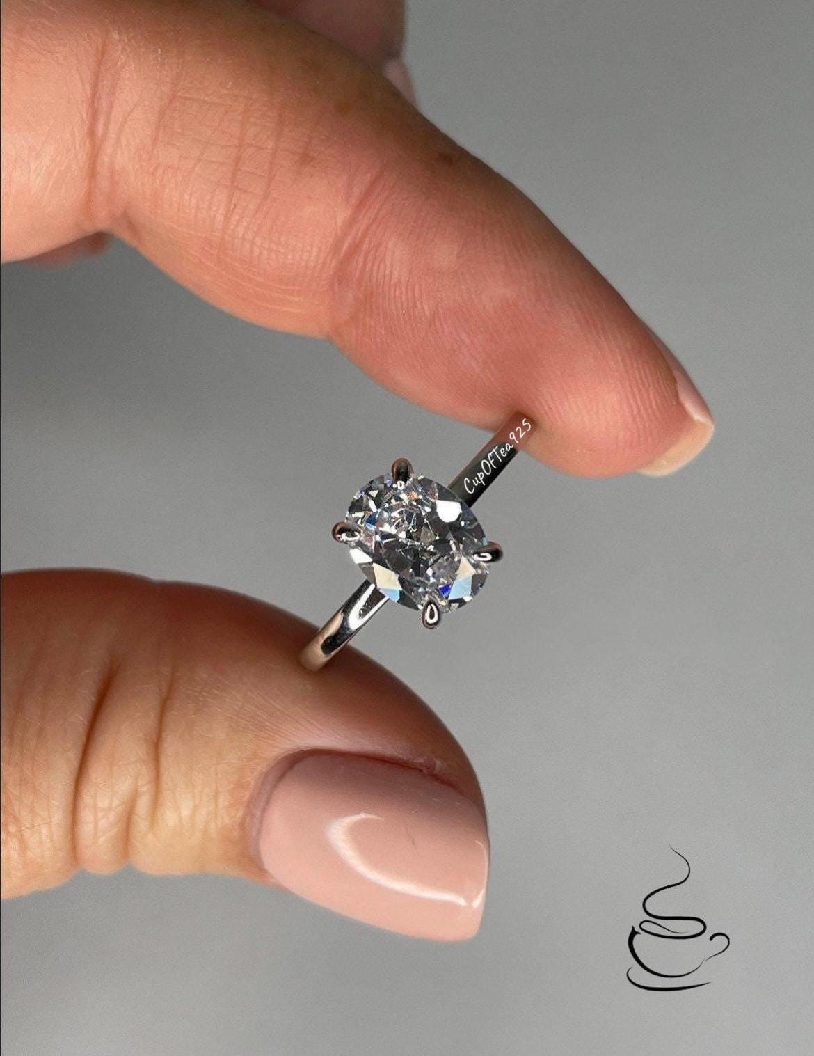 Sterling Silver 925 Engagement Ring with 2CT(7mm*9mm) oval cut simulated diamond and hidden halo