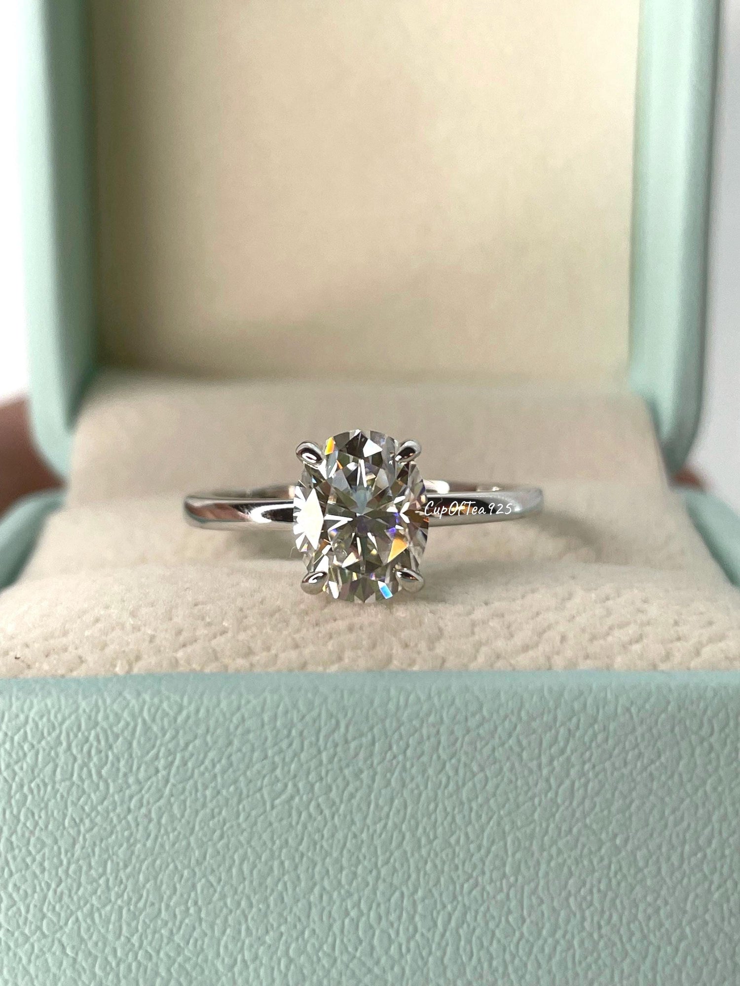 2CT moissanite engagement ring with hidden halo. Sterling Silver 925 Engagement Ring with 2CT(7mm*9mm) oval cut the finest D VVS moissanite