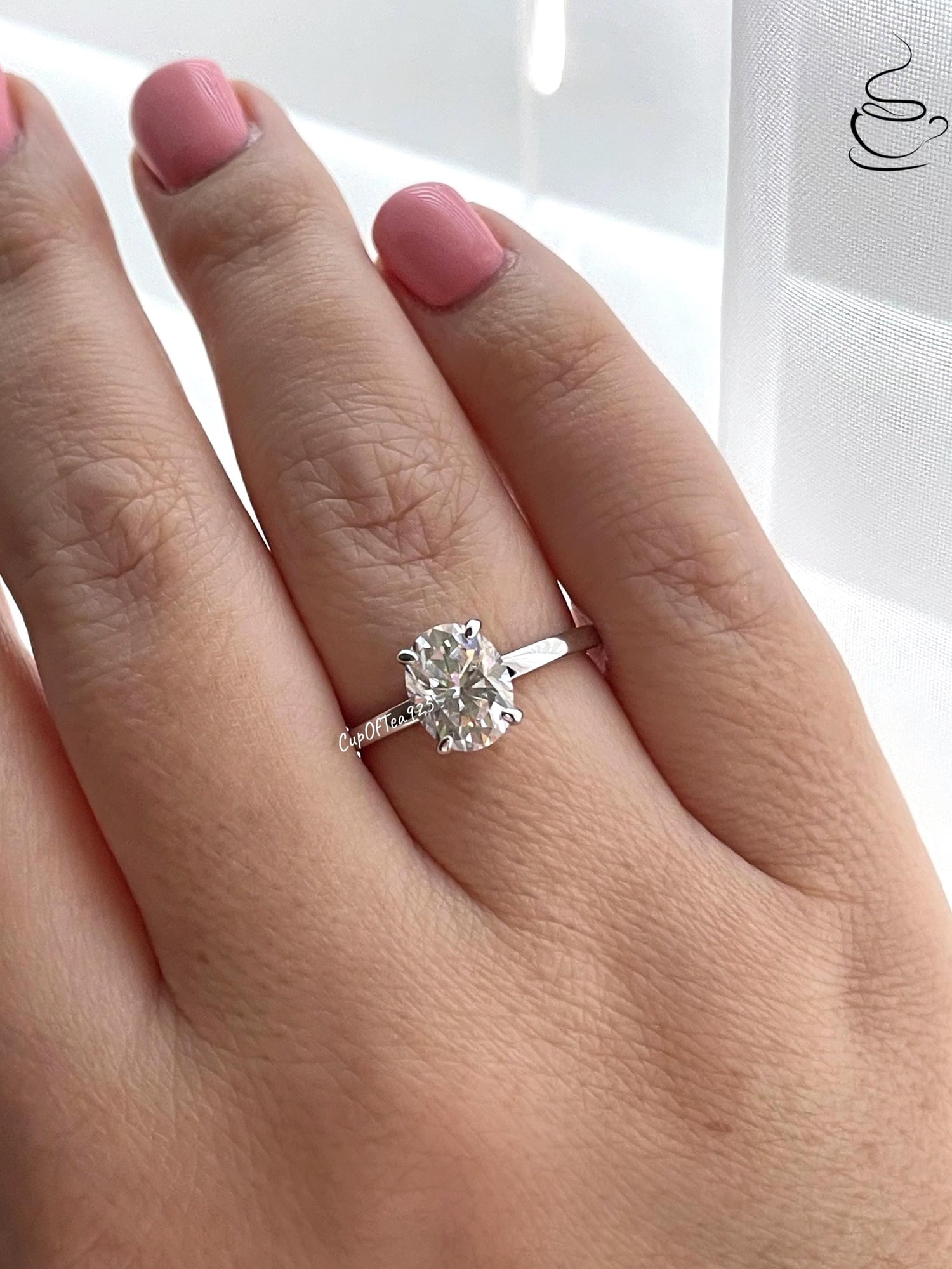 2CT moissanite engagement ring with hidden halo. Sterling Silver 925 Engagement Ring with 2CT(7mm*9mm) oval cut the finest D VVS moissanite