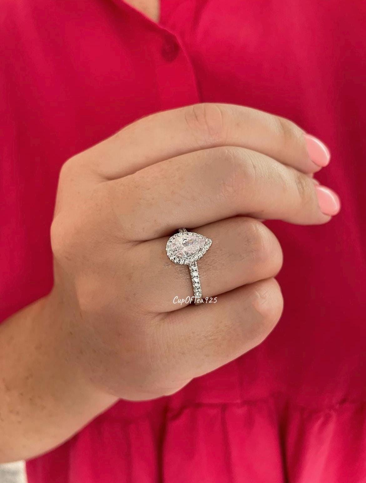 The Naomi. Sterling Silver 925 Pear Shaped, Tear Drop Engagement Ring with the Finest 5A CZ Diamonds