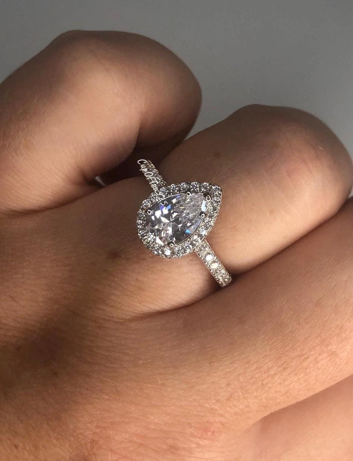 The Naomi. Sterling Silver 925 Pear Shaped, Tear Drop Engagement Ring with the Finest 5A CZ Diamonds