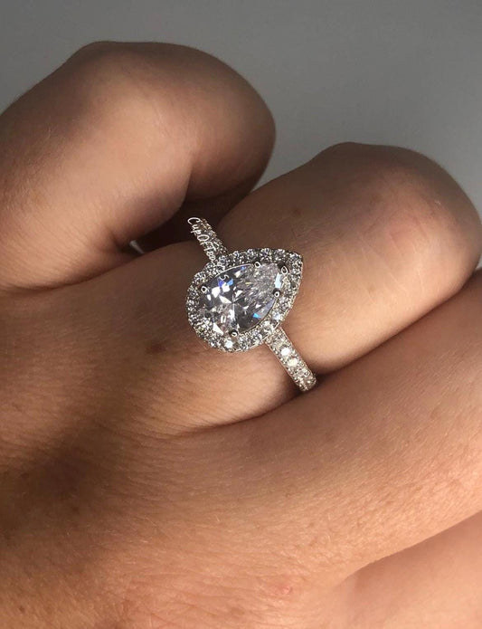 The Naomi. Sterling Silver 925 Pear Shaped, Tear Drop Engagement Ring with the Finest 5A CZ Diamonds