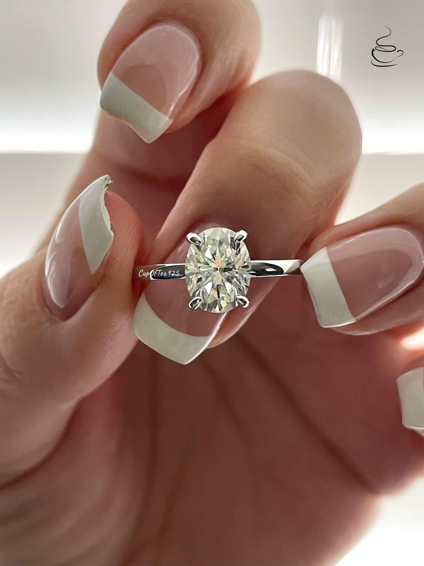 2CT moissanite engagement ring with hidden halo. Sterling Silver 925 Engagement Ring with 2CT(7mm*9mm) oval cut the finest D VVS moissanite