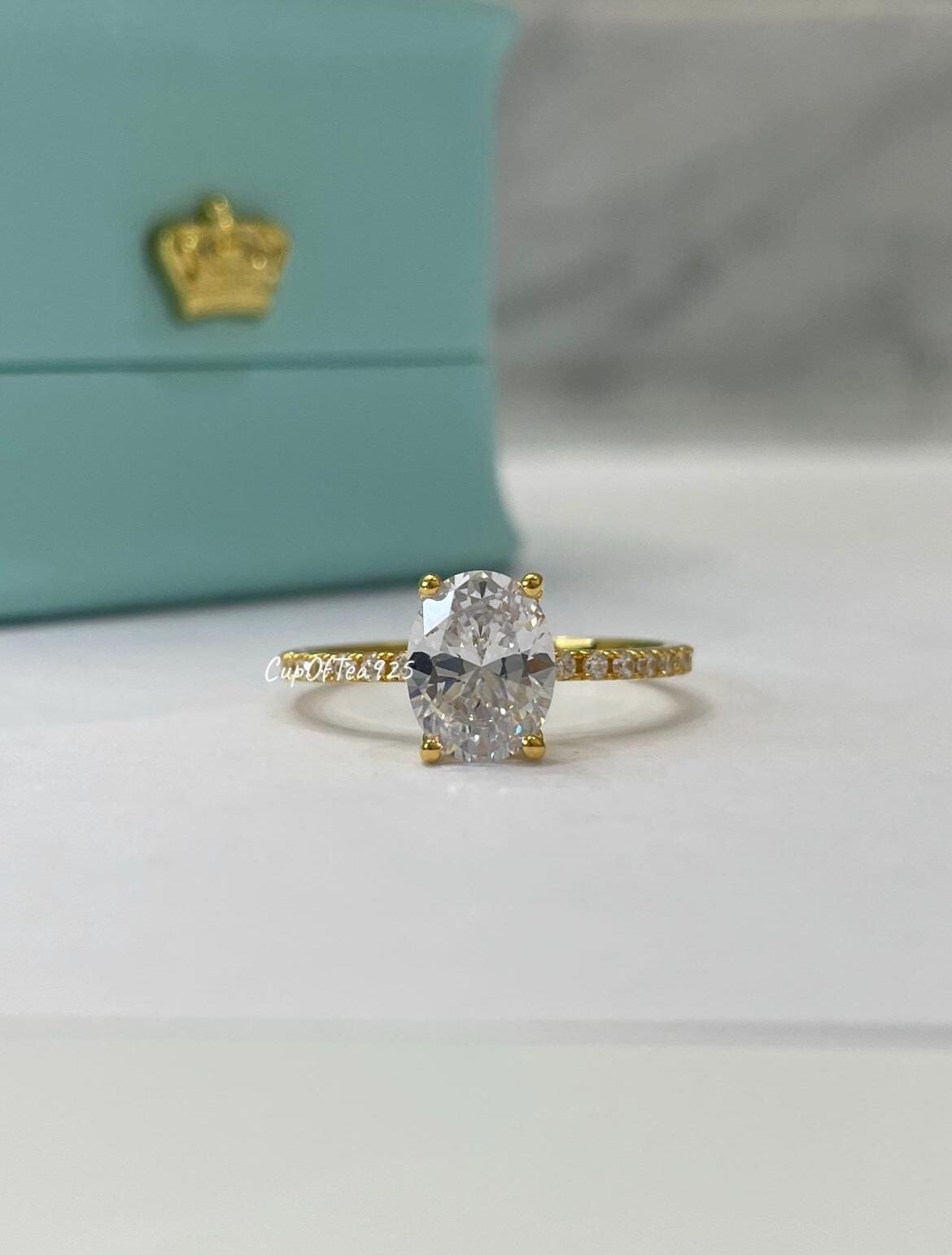 The Olivia. Yellow Gold Vermeil Engagement Ring with the finest 2CT oval cut simulated diamond