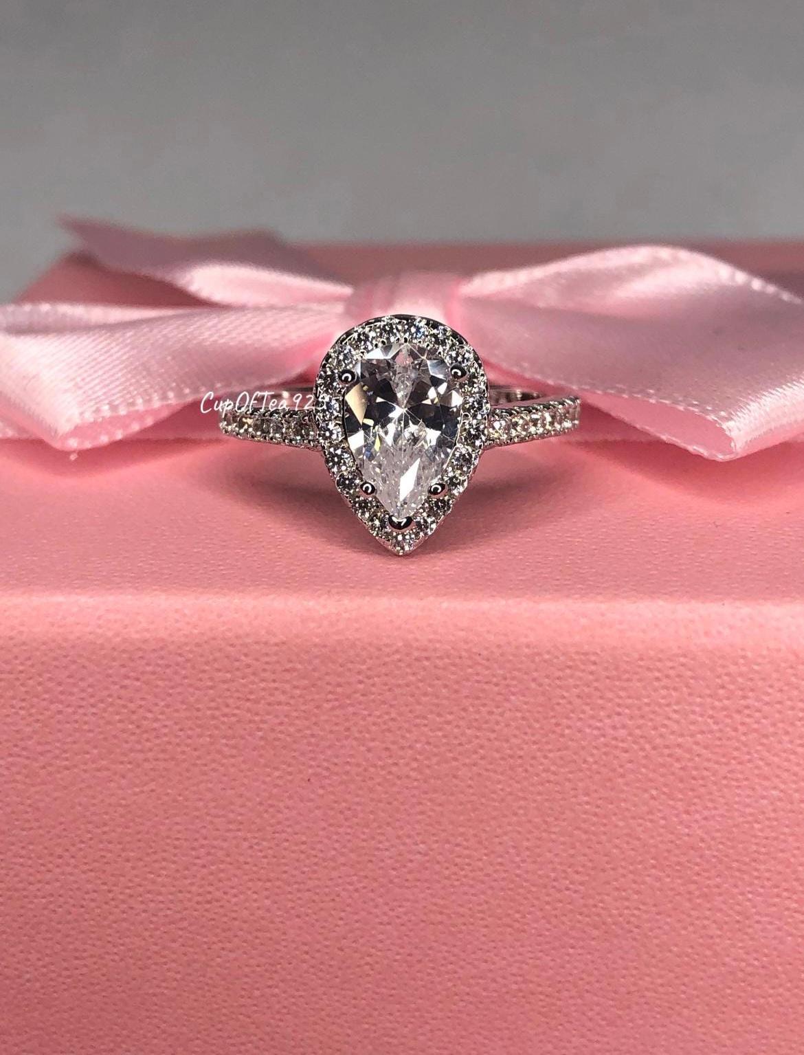 The Naomi. Sterling Silver 925 Pear Shaped, Tear Drop Engagement Ring with the Finest 5A CZ Diamonds