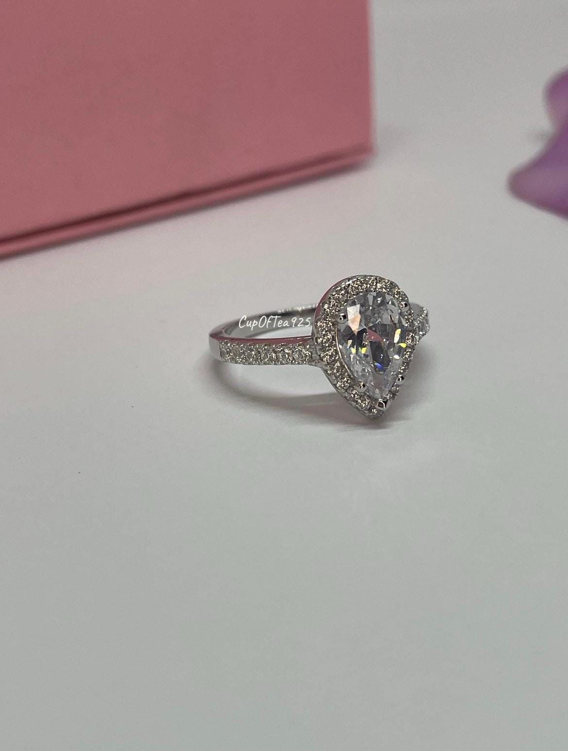 The Naomi. Sterling Silver 925 Pear Shaped, Tear Drop Engagement Ring with the Finest 5A CZ Diamonds