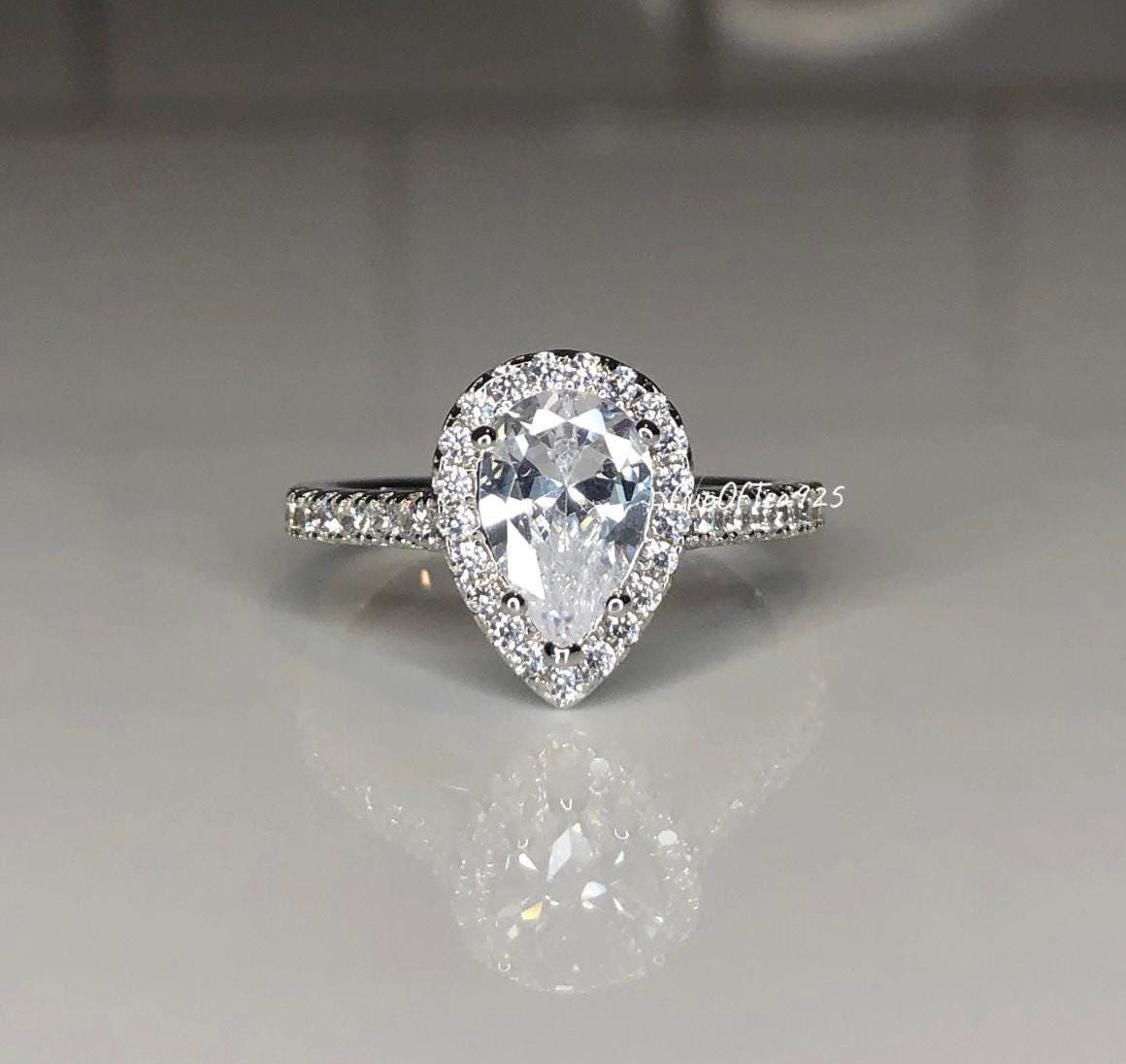 The Naomi. Sterling Silver 925 Pear Shaped, Tear Drop Engagement Ring with the Finest 5A CZ Diamonds
