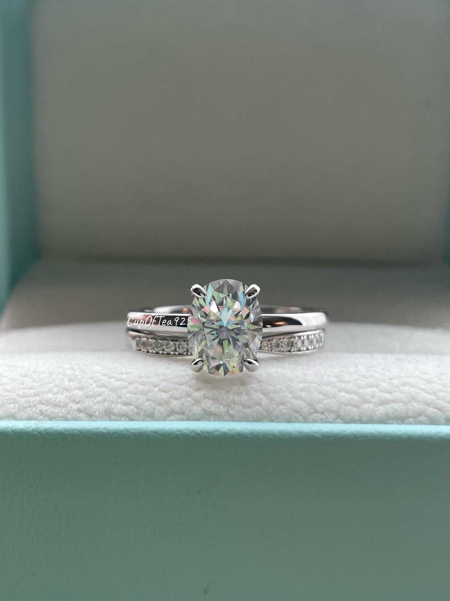 Moissanite engagement ring set. Sterling Silver 925 bridal set with 2CT oval cut moissanite or CZ solitaire and curved moisanite band.