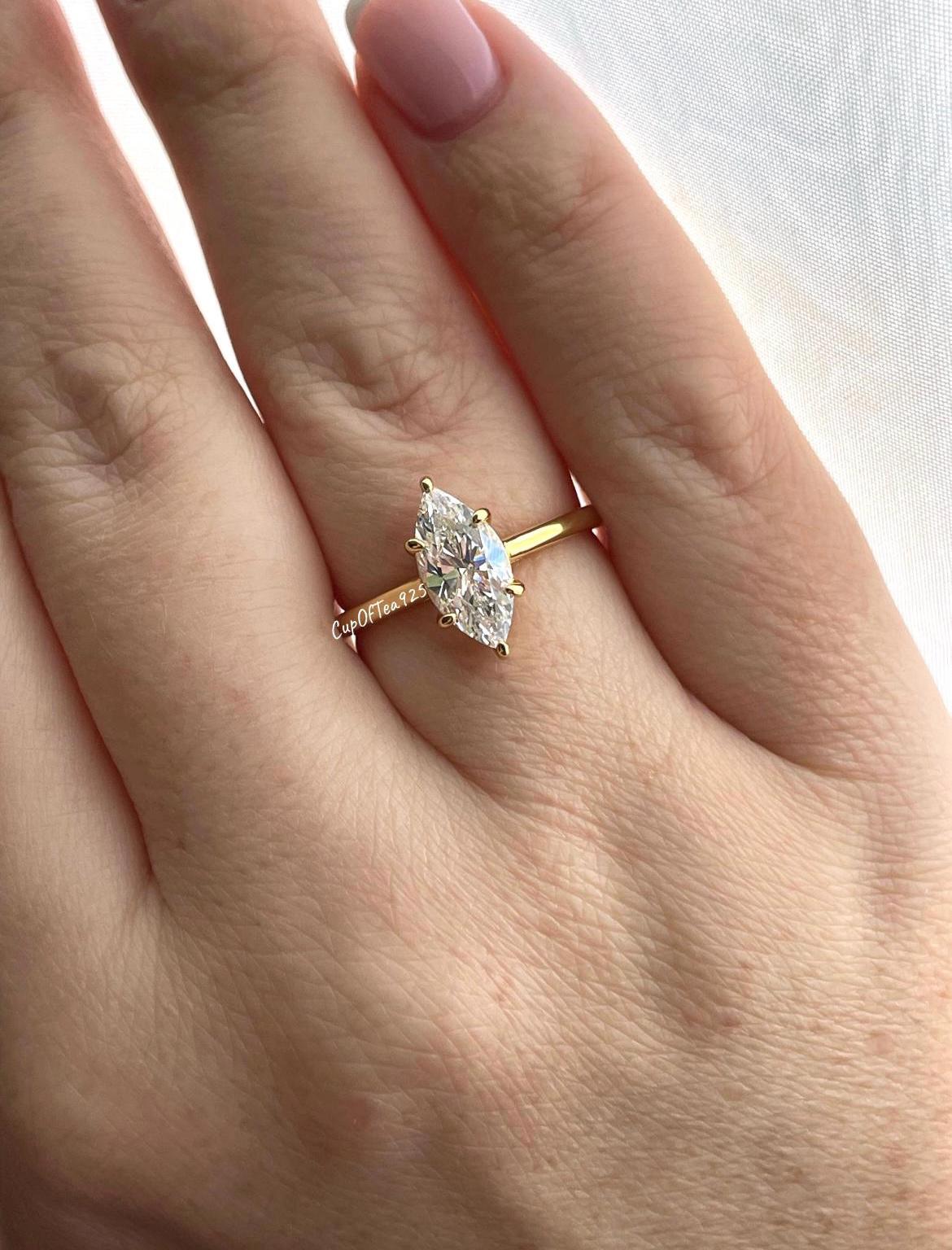 Moissanite engagement ring. 10K, 14K, 18K gold ,Sterling Silver 925 engagement ring with 2CT marquise cut moissanite.