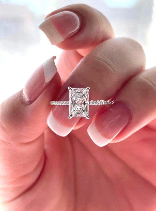 The Harmony. Hidden Halo. Sterling Silver 925 engagement ring with 2.2CT radiant cut CZ simulated diamond and hidden halo, extra thin band