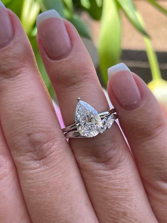 Sterling silver 925 bridal set with 2CT, 3CT pear cut CZ simulated diamond engagement ring and curved wedding band