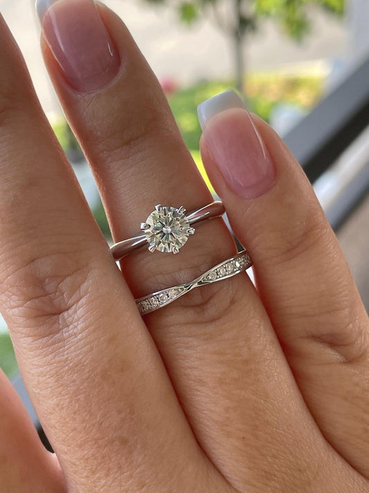 Sterling Silver 925 bridal set with 1CT round brilliant cut D VVS moissanite solitaire and curved moissanite wedding bend.