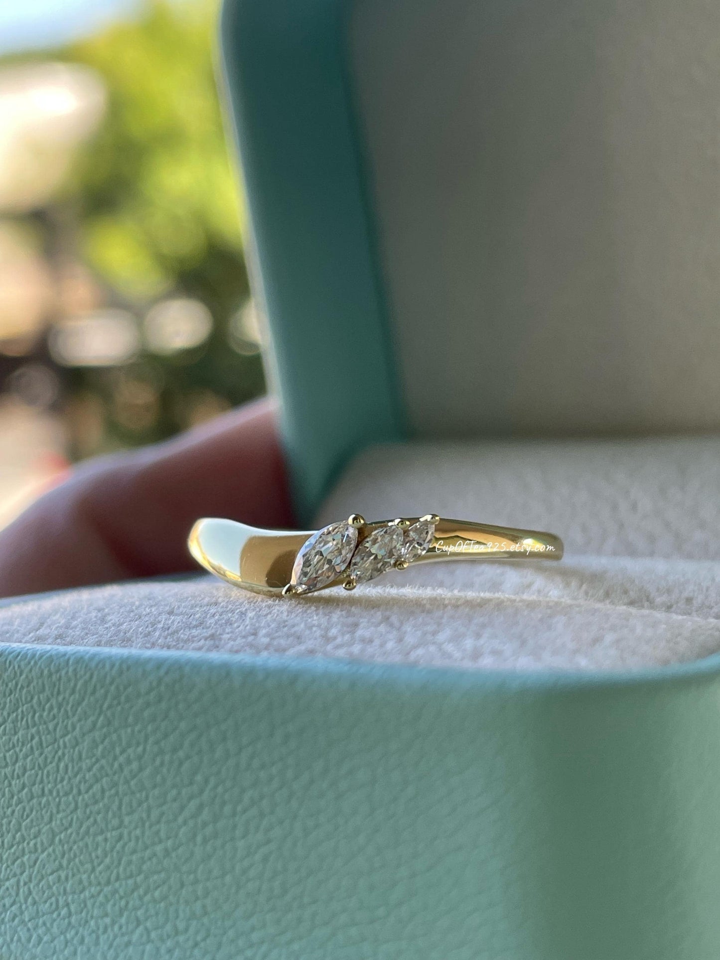 Curved wedding band. Yellow gold, rose gold over silver 925 curved stacking band with marquise cut CZ diamonds