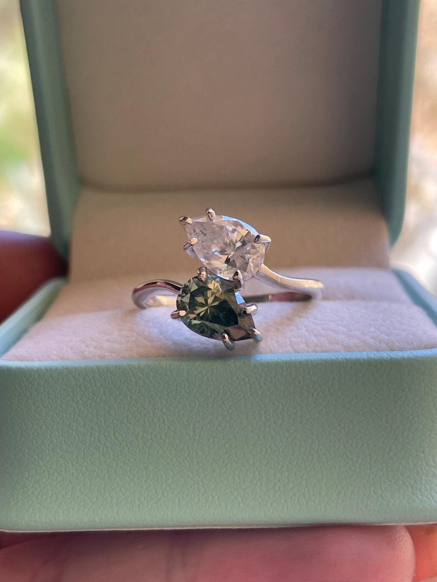 Moissanite Toi et Moi engagement ring. Sterling Silver 925 Toi et Moi with green and white pear cut moissanite, birthstone ring
